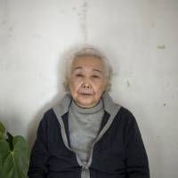 Li Fengqin believes her father was cut apart live by Japanese doctors at a covert base used for human experiments. Seen at her home in Changchun, Jilin province, on Jan. 8, Li hopes Tokyo will one day confront one of World War II’s most barbaric chapters. 70 years on, Unit 731's wartime atrocities fester in China's memory