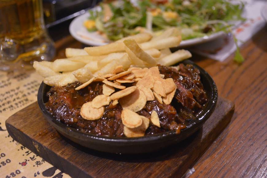 Buff Beef festival: Wild steak topped with roasted garlic, served with fries | J.J. O'DONOGHUE