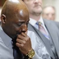 An emotional Floyd Dent tells his story about his alleged beating by Inkster police in January to members of the media Wednesday at his attorney's office in Novi, Michigan. His attorney, Gregory J. Rohl, is in the background. Video shows motorist pulled from car, beaten by police in Michigan