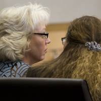 Debra Milke (left) sits in court with her attorney, Lori Voepel, during a hearing, Monday in Marcopa County Superior Court in Phoenix. Judge Rosa Mroz dismissed murder charges Monday against Milke without prejudice and ordered a probation officer to remove a monitoring device from her ankle. Milke, 51, spent 23 years on Arizona death row for the December 1989 murder of her 4-year-old son, Christopher. Murder charges dismissed after woman spent 22 years on Arizona death row