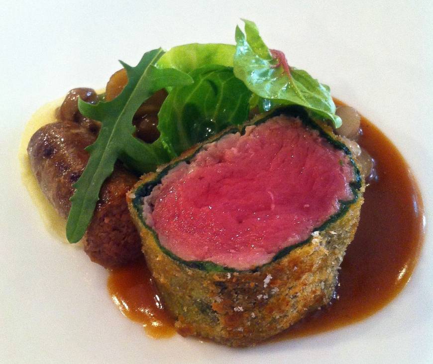 Chic Peut-etre Tender: Lamb wrapped in spinach with merguez sausage, Japanese mushrooms and baby broad beans. | ROBBIE SWINNERTON
