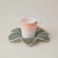 Cup and saucer in the shape of a bud by Bing & Grondahl (1895-98) The Suzukis' coffee cups runneth over