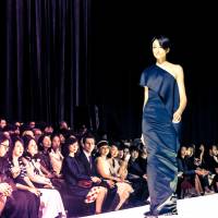 Ai Tominaga shows off a dress from Adeam Tokyo fashion week: Womenswear celebrates an eclectic lineup; menswear draws inspiration from the street