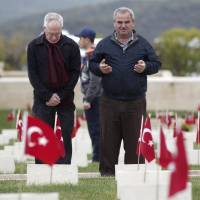Bruce Scates (left), grandson of Private Thomas Charles Scates, and Halil Koc, grandson of Turkish veteran Halil Koc, pray Wednesday at the Turkish cemetery in Gallipoli ahead of the 100th anniversary of the Battle of Gallipoli. Thomas Charles Scates served with the Royal Marines at Quinn’s Post in April 1915, survived the Battle of Gallipoli and later fought on the Western Front. Halil’s grandfather Gazi Halil Koc survived the Battle of Gallipoli and died at the age of 102 in 1998. Gallipoli legend lives on in Australia and New Zealand