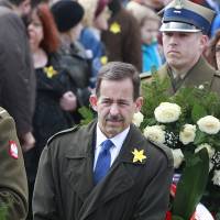 U.S. Ambassador Stephen Mull attends ceremonies marking the 72nd anniversary of the Warsaw Ghetto Uprising, in front of the monument to the Heroes of the Ghetto, in Warsaw on Sunday. A few hundred Jews at the ghetto rose with arms on April 19, 1943, against the Nazi forces who began to transport hundreds of thousands of ghetto residents to the Majdanek death camp. Later Sunday, Mull was summoned to Poland's Foreign Ministry, which protested recent words by FBI director James Comey, who alleged that the Poles were accomplices of the Germans in the Holocaust. Poland summons U.S. envoy, gets apology over FBI chief's Holocaust claim