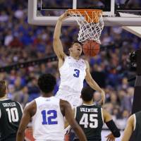Throw it down: Duke's Grayson Allen dunks during the team's national semifinal game against Michigan St. on Saturday. Duke, Wisconsin brace for title tilt
