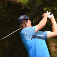 Sublime start: Jordan Spieth tees off during the first round of the Masters on Thursday in Augusta, Georgia. Spieth leads Masters with 64