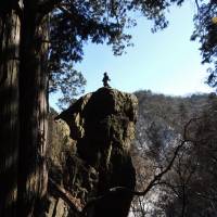 A bronze goblin priest overlooks the land at Tengu Rock. Bouldering, a remedy to climbing the walls