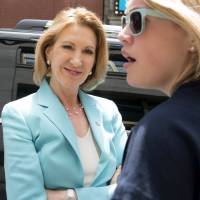 Former Hewlett-Packard Co. Chief Executive Carly Fiorina (left) arrives for her interview with Yahoo Global News Anchor Katie Couric in New York on Monday, when she announced she is running for president, and took a shot at Democratic front-runner Hillary Rodham Clinton, who she said represents a political class that Americans are “disgusted” with. Republican ex-Hewlett-Packard CEO Fiorina enters 2016 race, takes shot at Clinton