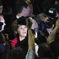 Scottish First Minister Nicola Sturgeon celebrates the results for her Scottish National Party in Glasgow on Friday. Scottish nationalists crush opponents, setting stage for new independence bid