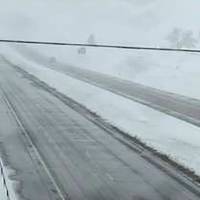 Snow covers the ground off Interstate 90 east of Sturgis, South Dakota, in this view from a highway camera taken Sunday. Hail, snow, a tornado and a tropical storm made it a “severe weather” Mother’s Day in much of the center of the United States and on the Carolina coast on Sunday. Mother's Day east of the Rockies: Blizzard, hail, tornado, tropical storm