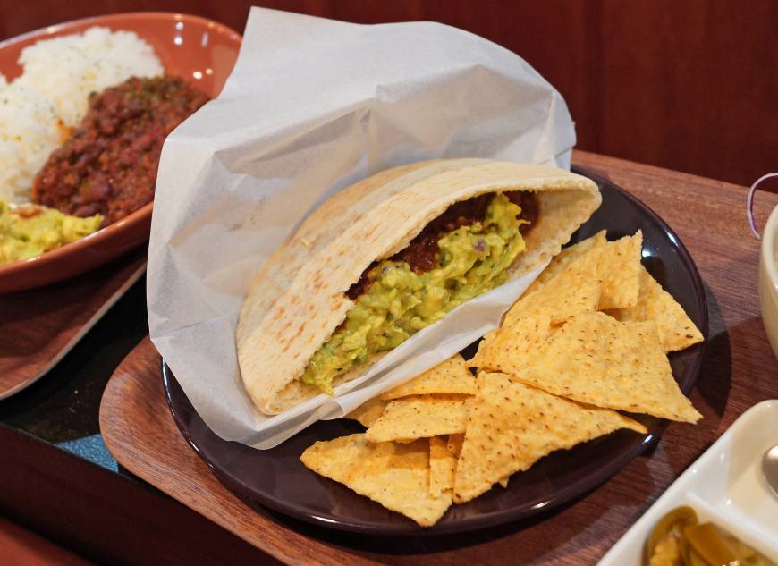 Om Nom Nom In the halal pocket: Om Nom Nom's specialties are its 100 percent halal-chili sets, which come with toppings such as jalapenos or freshly made guacamole. | ADAM MILLER