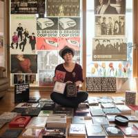 Age ain’t nothing but a number: K-pop fan Lee Un-young sits among her musical memorbilia. Passion and lunch boxes: K-pop's 'auntie' fans stand proud