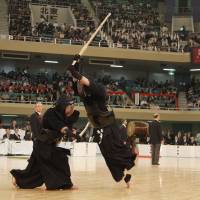 Revered art: Competitors clash at the All Japan Kendo Championship at the Budokan in Tokyo. Know the way of the sword, know thyself: a kendo primer