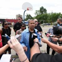 Detroit Police Chief James Craig talks to media Sunday near the scene of a block party where three men exchanged gunfire on Saturday in Detroit. At least one person is dead and several wounded at the event attended by hundreds. Detroit neighborhood said afraid to speak up after block party shooting kills one, wounds 11