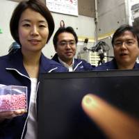 Lena Okajima (left), CEO of the space technology venture ALE, Teikyo University lecturer Takeo Watanabe (center) and Tokyo Metropolitan University associate professor Hironori Sahara speak June 5 in Tokyo about their business to produce shooting stars. Wishing on a shooting star in Japan with man-made meteors