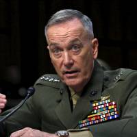 Marine Corps Gen. Joseph Dunford testifies during the Senate Armed Services committee nomination hearing to be chairman of the Joint Chiefs of Staff on Capitol Hill in Washington on Thursday. Marine general says Russia poses 'greatest threat' to U.S., backs arming Ukraine