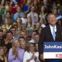 Ohio Gov. John Kasich announces he is running for the 2016 Republican party’s nomination for president during a campaign rally at Ohio State University, Tuesday in Columbus, Ohio. Kasich, a two-term governor and former congressman, has little name recognition in the crowded GOP field, but he is already airing television ads in New Hampshire, where he is heading immediately after making his run official. Ohio Gov. Kasich joins GOP race as candidate No. 16