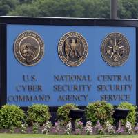 In this June 6, 2013, file photo, a sign stands outside the National Security Administration (NSA) campus on in Fort Meade, Maryland. The Obama administration has decided that the National Security Agency will soon stop using millions of American calling records it collected under a controversial program leaked by former agency contractor Edward Snowden. Administration wants NSA to stop viewing old U.S. phone records, destroy the data