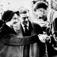 The Duke of Windsor (center) and his wife, Wallis Simpson, meet with German Chancellor Adolf Hitler in October 1937. 'Heil Hitler' salute photo shines light on British royals, Nazis