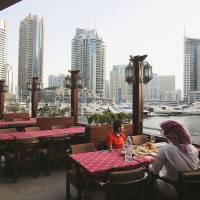 Culinary delights: Visitors dine at the world-renowned Reem al-Bawadi restaurant in Dubai. Dubai Marina challenges Middle East preconceptions