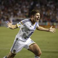 Steven Gerrard celebrates after scoring for the Galaxy during his MLS debut on Friday. Gerrard scores in MLS debut as Galaxy beat Quakes