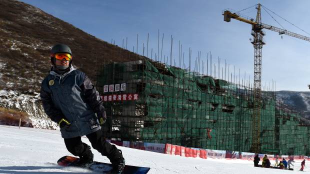 A man snowboards at the Yunding Ski Field, one of the proposed venues for Alpine skiing if Beijing wins the bid to host the 2022 Winter Games. Beijing confident in 2022 Games bid