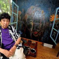 Work in progress: I'm sure people will think it is about the earthquake and everything that has happened, graphic-designer-turned-artist Tadanori Yokoo said of this dark urban landscape he was painting at his studio in Tokyo last month. Tadanori Yokoo: An artist by design