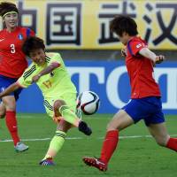 Japan’s Saori Arimachi takes a shot during Tuesday’s match against South Korea at the Women’s East Asian Cup in Wuhan, China. South Korea defeated Japan 2-1. South Korea edges Nadeshiko Japan in Women's East Asian Cup