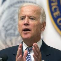 Vice President Joe Biden speaks during a Sept. 10 news conference at the Office of the Chief Medical Examiner in New York. Reaching for a successful end to global climate talks, Biden will call on other nations to commit to ambitious cuts in greenhouse gases at a gathering of U.S. and Chinese leaders Wednesday in Los Angeles. On Tuesday, he slammed GOP candidate Donald Trump's xenophobic immigration rants. Biden thumps Trump for appealing to baser, xenophobic attitudes via 'sick message' on U.S. immigration