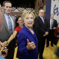 Democratic presidential candidate Hillary Rodham Clinton greets audience members following a community forum on health care Tuesday, at Moulton Elementary School in Des Moines, Iowa. Clinton comes out against Keystone XL pipeline, calls for $250 a month cap on prescription expenses
