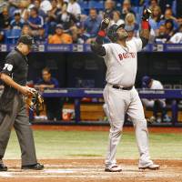 Red Sox slugger David Ortiz celebrates after connecting on the 500th home run of his career on Sarturday. Ortiz hits 500th homer of career in win