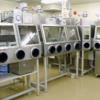 Workers of the laboratory that handles the most hazardous viruses, located in Musashimurayama, Tokyo, must deal with microbes inside sealed containers. Deadly disease lab opens amid local fears