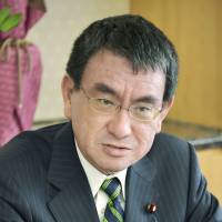 Taro Kono Japan's new police czar urges tightening of yakuza law, cyberdefense