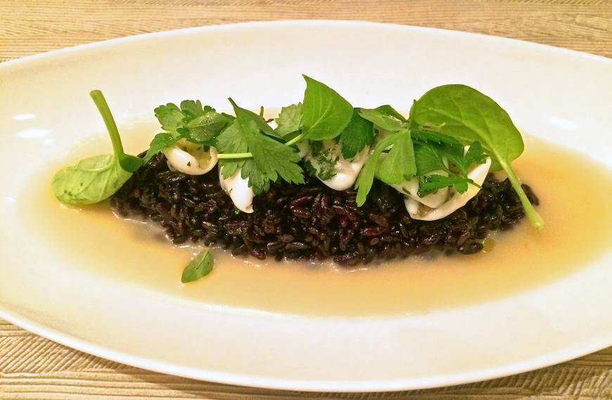 & ecle The signature 'Coulicious': Organic black rice topped with tender squid is one variation on the theme of the signature dish at the new & ecle in Omotesando. | ROBBIE SWINNERTON