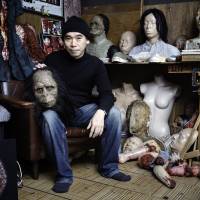 Fright night: Special effects artist Zerai Naoi sits in his studio surrounded by some of the work he has created for film and stage. The gorgeous world of Japanese gore
