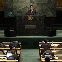 Big speech: Prime Minister Shinzo Abe addresses the 70th United Nations General Assembly last month. Abe raises eyebrows when he's off script