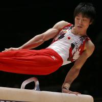 Kohei Uchimura performs on the pommel horse during the men’s all-around final competition at the world championships in Glasgow, Scotland, on Friday. Uchimura won his sixth straight title in the event. 'King Kohei' wins 6th world title
