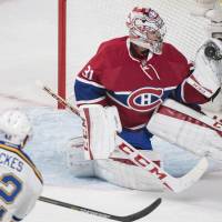 Canadiens goalie Carey Prices makes a save on a shot by the Blues’ David Backes during the first period of their game on Tuesday. Montreal won 3-0. Price stars for Canadiens