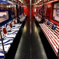 The New York City Subway 42nd Street shuttle train is viewed Tuesday covered in symbols from Nazi Germany and Imperial Japan, to promote the Amazon TV series, The Man in the High Castle. Amazon yank Nazi-, Imperial Japan-themed TV ads from N.Y. subway
