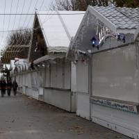 Shuttered stalls are pictured at a largely deserted Christmas market in Paris on Saturday following a series of coordinated attacks in and around Paris. Paris terror to prompt short-term drop in stocks, crude, tourism, euro, analysts forecast