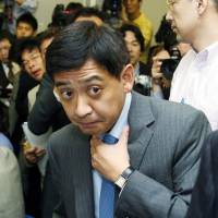 Fund manager Yoshiaki Murakami delivers a news conference in Tokyo in this file image from June 2006. Stock market fallout from Murakami probe seen limited