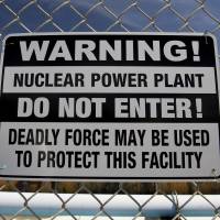 A warning sign hangs on a fence outside the Diablo Canyon nuclear power plant in Avila Beach, California, in March 2012. U.S. eyes extending life of nuclear plants to 80 years