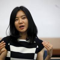 Hyeonseo Lee who came to South Korea in 2008, speaks during an interview with Reuters in Seoul in May 2013. North Korean author of 'The Girl with Seven Names' memoir still feels hunted
