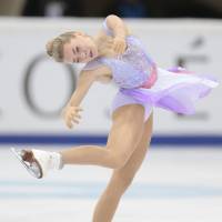 Elena Radionova performs her free program at the Cup of Russia in Moscow on Saturday Russian women earn sweep; Fernandez triumphs in men's event