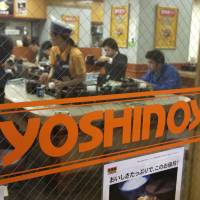 Customers eat in a Yoshinoya restaurant in Tokyo. The <em>gyudon</em> (sliced beef on rice) restaurant operator aims to boost operations at <em>udon</em> noodle subsidiary Hanamaru Inc. Yoshinoya aims to beef up 'udon' noodle restaurant business