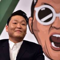 Still got style: South Korean pop star Psy talks to the media about his seventh album, Chiljip Psy-da, which was released this week. Psy says he has 'no chance' of another 'Gangnam Style' success
