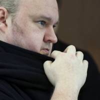German tech entrepreneur Kim Dotcom appears in an Auckland court on Wednesday. New Zealand judge rules Kim Dotcom can be extradited to U.S.