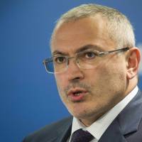A file picture taken on June 17 shows Mikhail Khodorkovsky, founder of Open Russia, speaking on Russia's Strategic Interest with the West at the Atlantic Council in Washington, D.C. Russia issues arrest warrant for Putin foe Khodorkovsky
