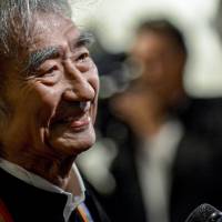 Conductor Seiji Ozawa walks the red carpet at the Kennedy Center in Washington on Sunday. Conductor Ozawa's recording, Watanabe's musical nominated for Grammys